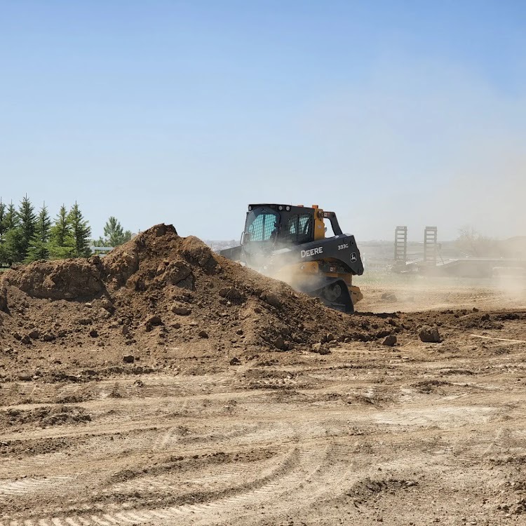 Skid Steer moving dirt